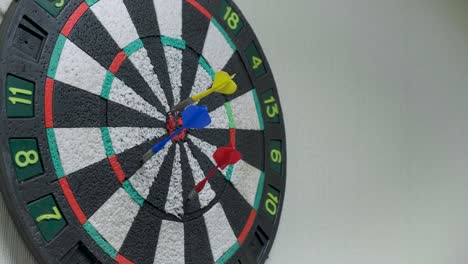 throwing three darts into the target aim and missing a ten points circle. 4k uhd video