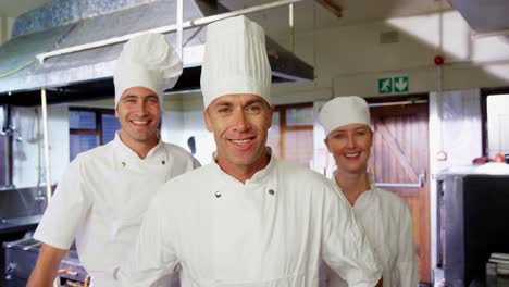 portrait of chefs in commercial kitchen