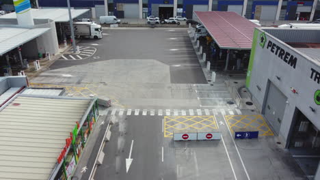 aerial view of a busy truck stop and gas station