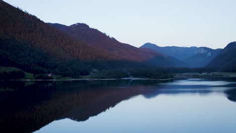 peaceful morning scnenery in the mountains with reflections in lake