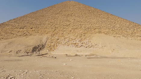 mesmerizing view of red or north pyramid at dahshur necropolis in cairo, egypt on bright sunny day