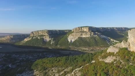 aerial view of mountain valley and town