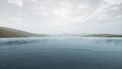 lake in hills on summer day