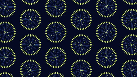 Symmetrical-spiral-pattern-of-yellow-and-blue-circles-on-dark-blue-background