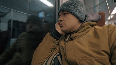 Timelapse-of-train-passenger-looking-out-the-window-during-evening-ride