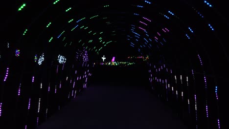 led lighting festival in the park walking through led tunnel