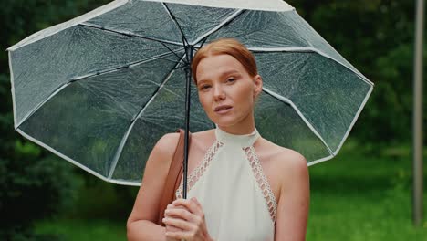 woman with umbrella in the rain