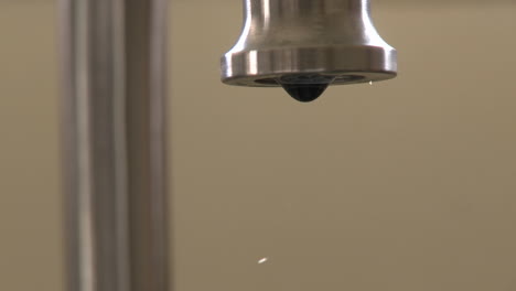 close up of water dripping slow from a faucet in oak view california