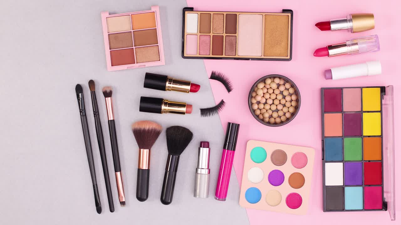 Make up products appear from right to left on silver pink theme. Stop motion