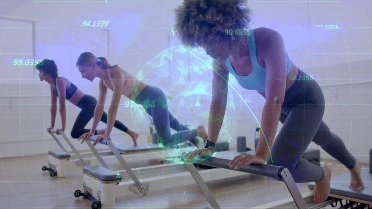 Women exercising on reformer machines with digital data overlay animation