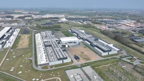 data center, computing center in odense, denmark, big tech, it, ai, infrastructure, aerial drone video of the complex.