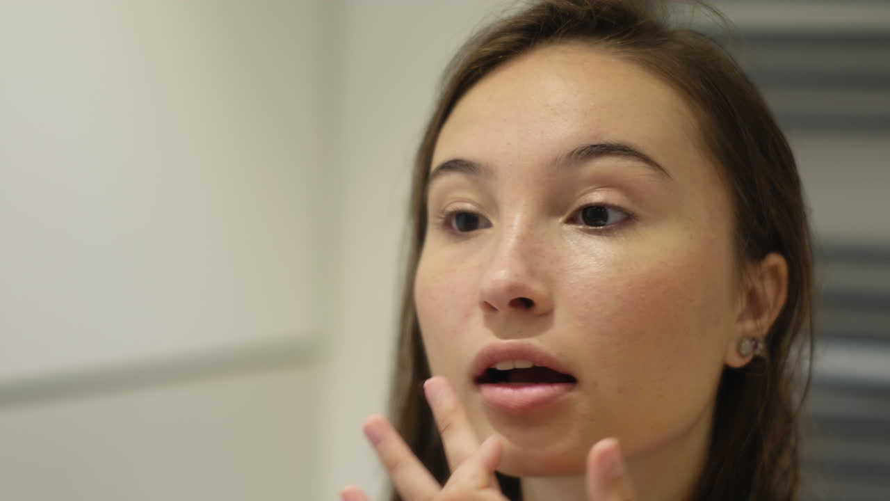 Woman applying makeup