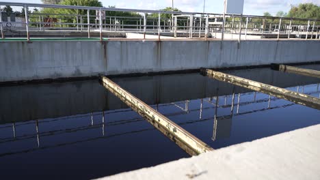 purified wastewater in treatment plant on a sunny day