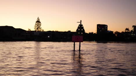 evening view of waterway with signage