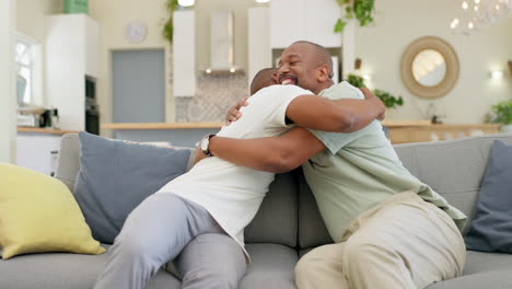 Hug,-talking-and-a-father-and-son-on-the-sofa
