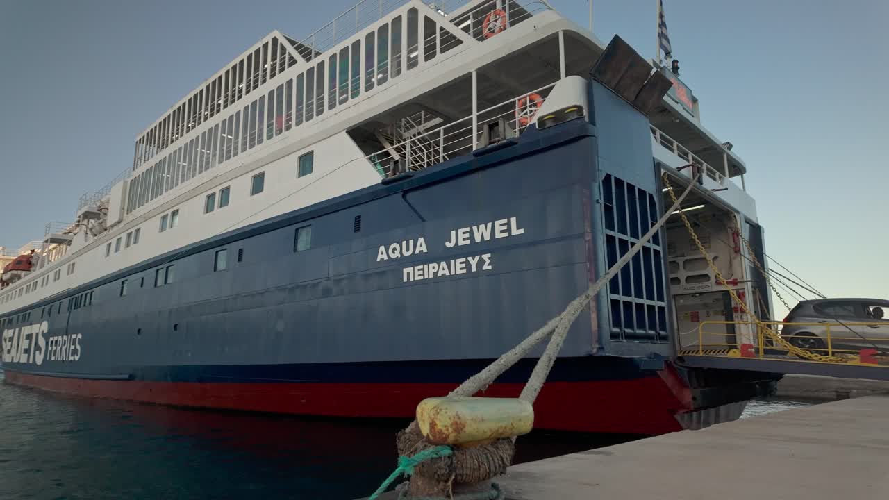 Vehicles disembark Greek car ferry ship docked Pelopennese port