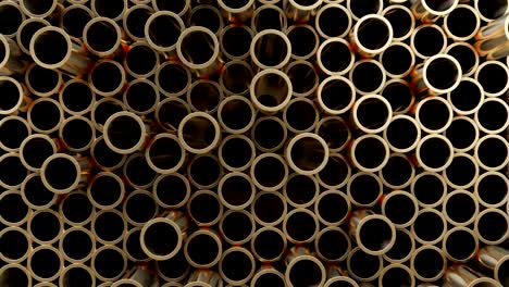 3d illustration. wall of brass pipes. randomly located
