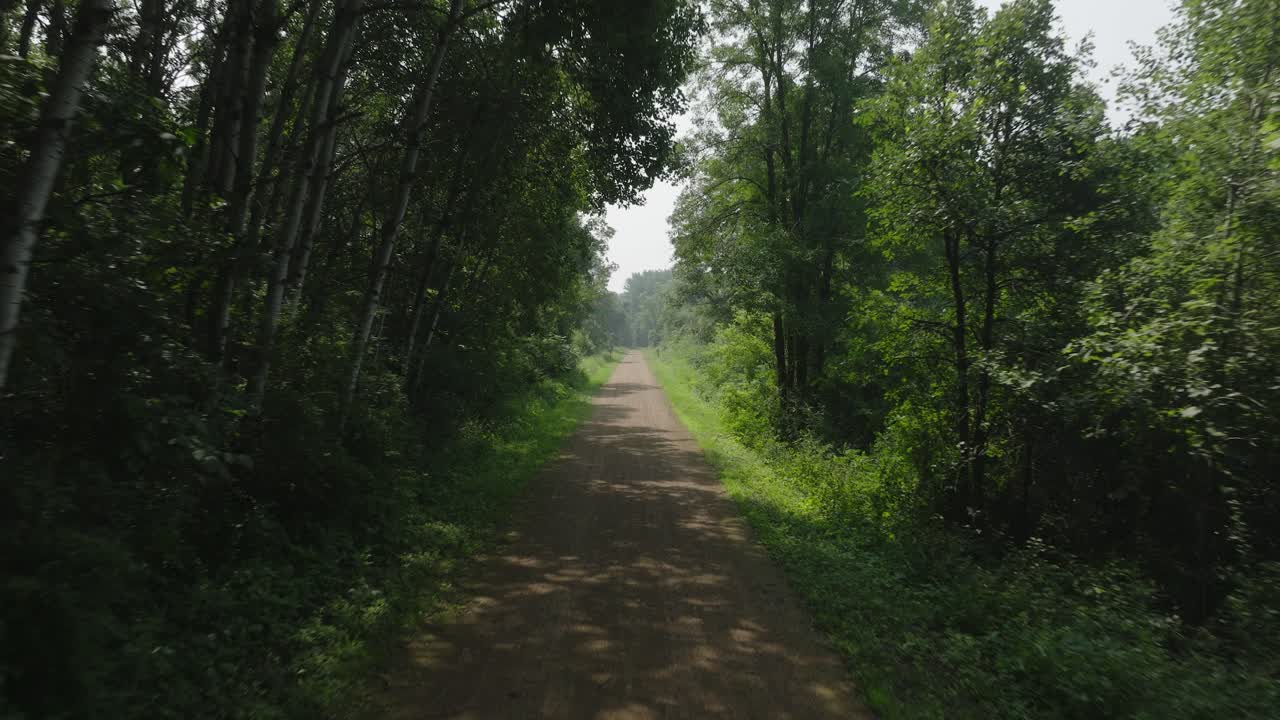 Flying Down The Gandy Dancer State Trail At St. Croix Falls In Wisconsin, United States. Aerial Drone Shot