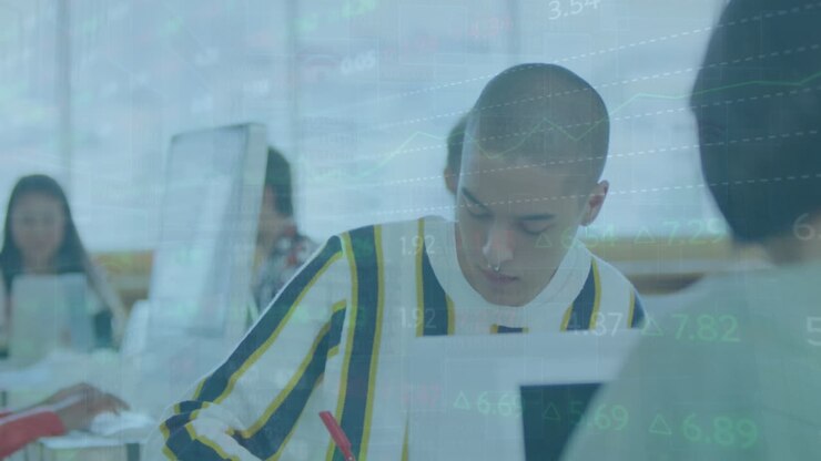 Animation of stock market data processing over biracial man taking notes at office