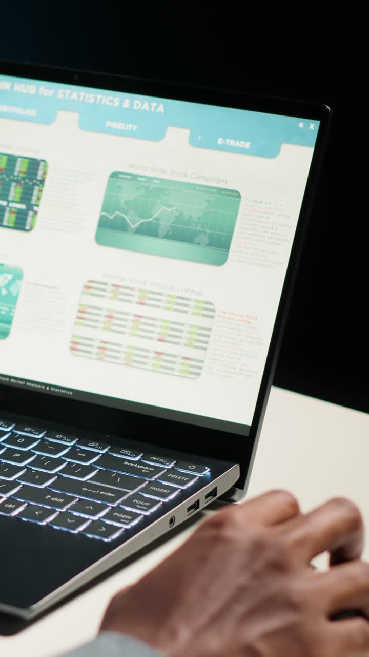 Laptop displaying stock market data