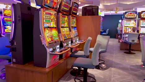 empty casino with colorful slot machines