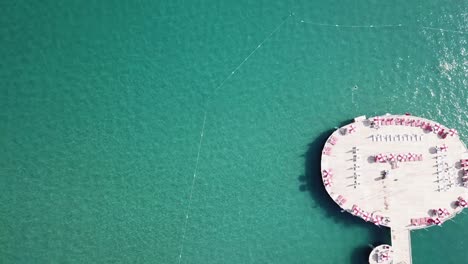 aerial view of a circular pier beach club