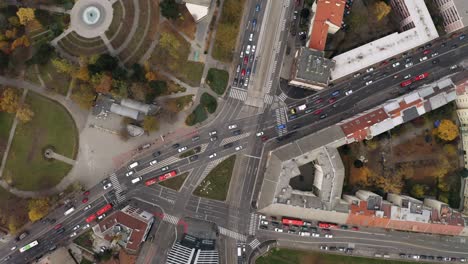 wide aerial descending top shot of cars traffic driving racianske myto intersection in bratislava, slovakia