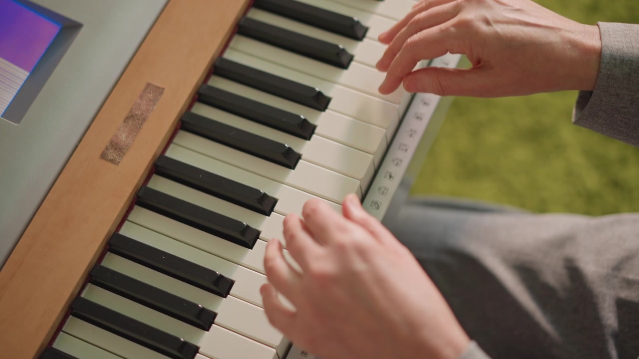 Elderly hands playing piano keys with practiced control, shaping melody and phrasing in quiet study, focused improvisation and harmonic exploration, thoughtful tempo and gentle touch