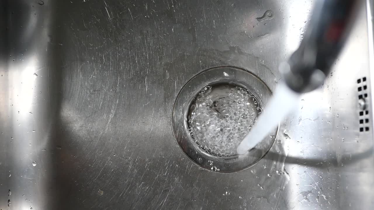Water Running into Kitchen Sink Drain