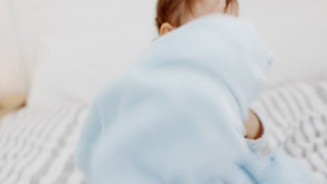 happy, baby and smile at home on a bedroom bed