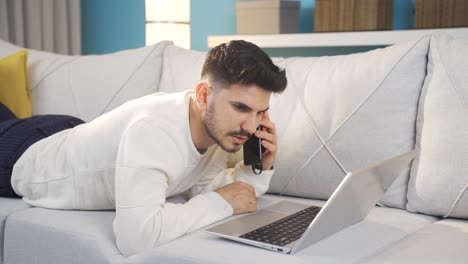 Young-man-using-power-bank.