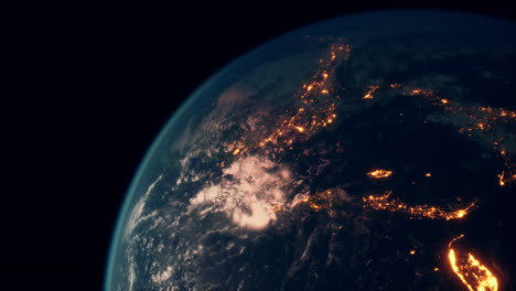 earth planet viewed from space at night showing the lights of countries