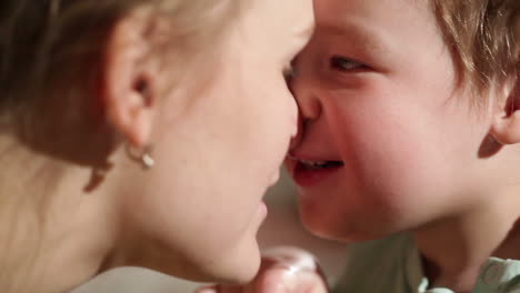 mom and her son kissing lovely close ups