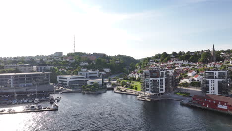 flying on scenic seaside town and seaport at arendal in agder, norway