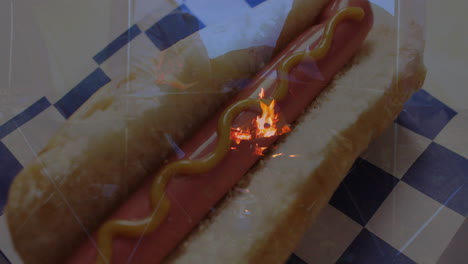 hot dog with mustard overlaid with animation of flickering flames