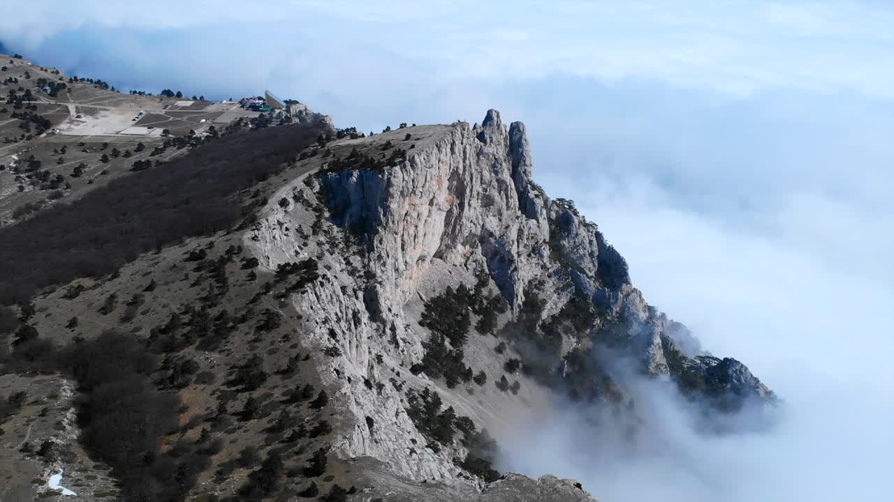 Mountain Peak in Clouds