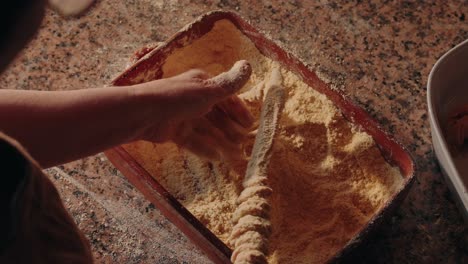 pig intestine coated with cornmeal for sausage in north portugal minho tradition