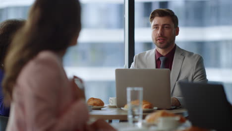 two colleagues talking in workplace