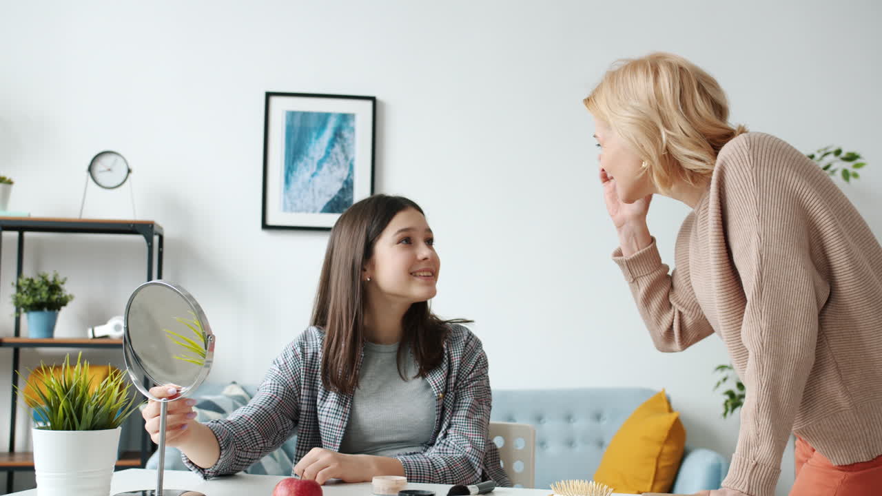 Mother and Daughter Applying Makeup