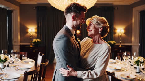 an affectionate embrace at a formal event