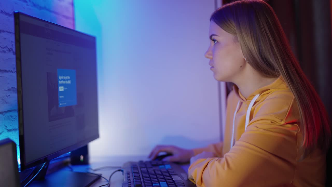 Woman at home at computer. Shot of attractive woman working on computer