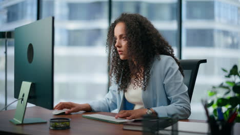 shocked director reading information computer closeup. girl browsing in office