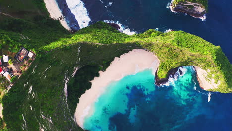 tropical kelingking beach and blue lagoon hidden below steep cape