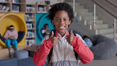 a boy giving thumbs up in a library