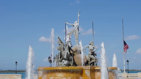 Raices-fountain-in-the-historical-Paseo-de-la-Princesa-promenade-in-Viejo-San-Juan,-Puerto-Rico