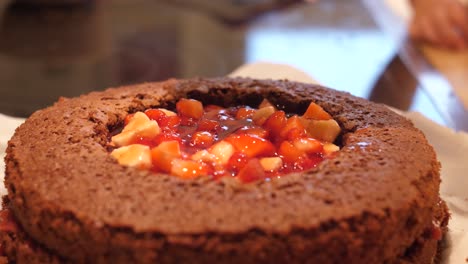 chocolate cake decorated with strawberries and gels