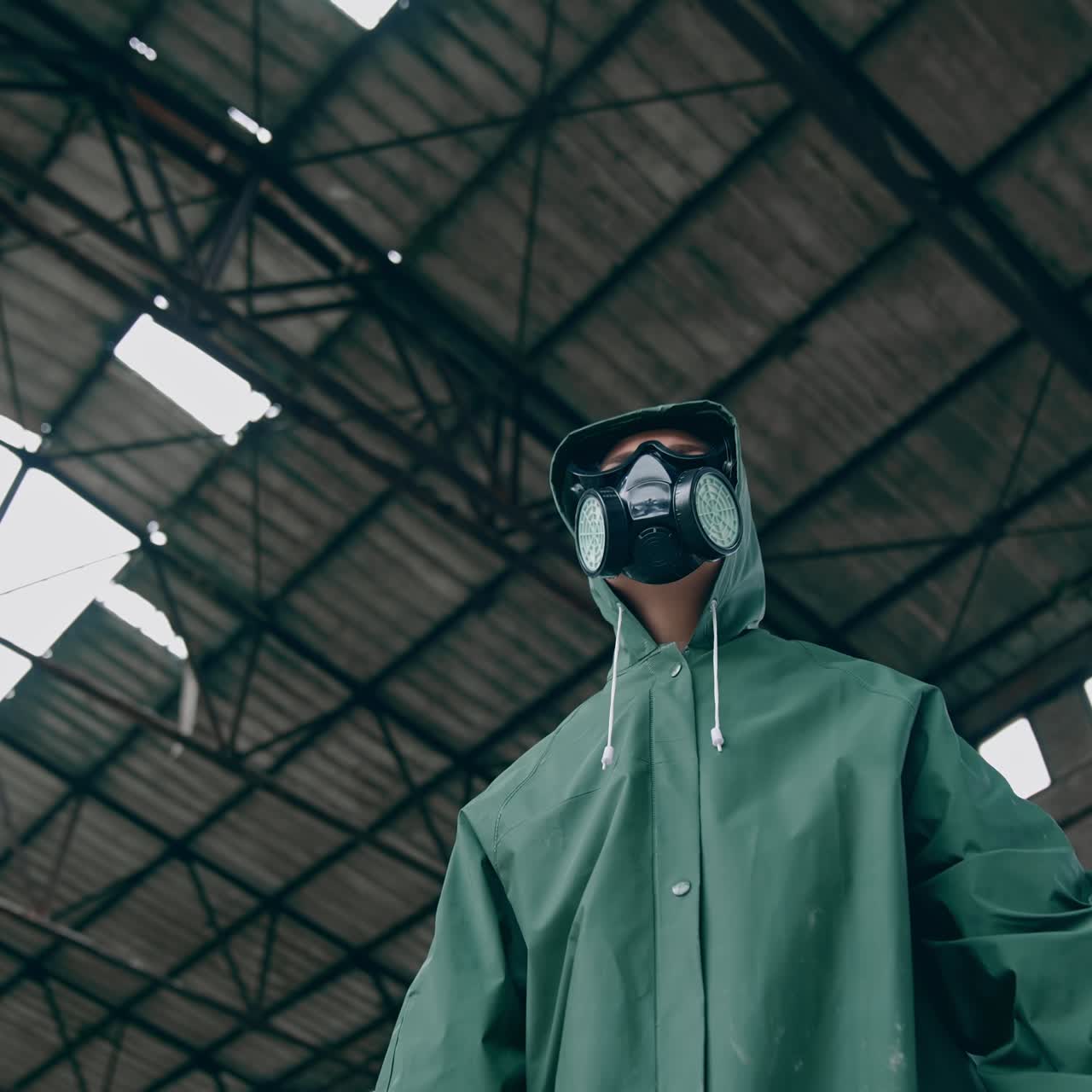 Man in chemical protection. Man in respirator against nuclear background