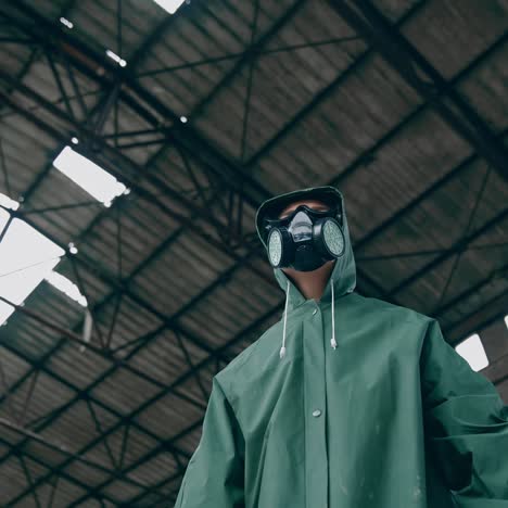 man in chemical protection. man in respirator against nuclear background