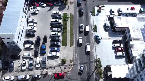 Santo-Domingo,-Dominican-Republic--May-2023---View-from-a-drone-over-the-streets-with-some-buildings-around