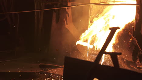 molten metal pouring in a foundry